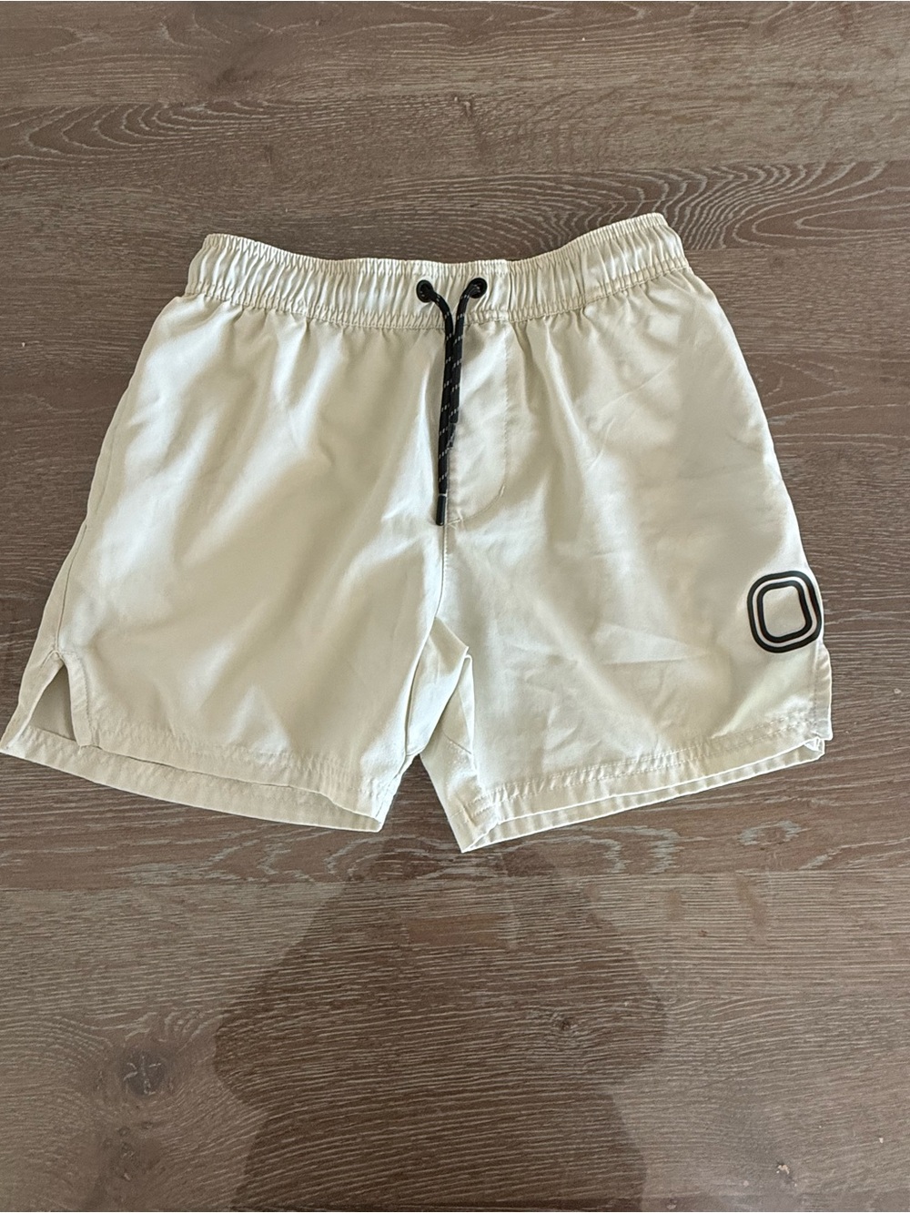 Kids Cream Swim Shorts with Black Drawstring